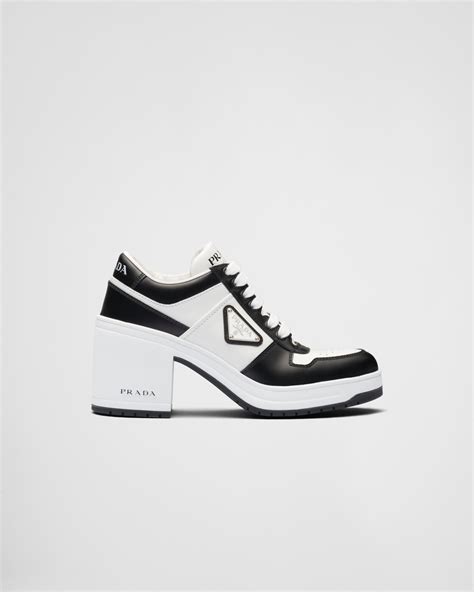 prada downtown high-heeled leather sneakers|prada high top designer sneakers.